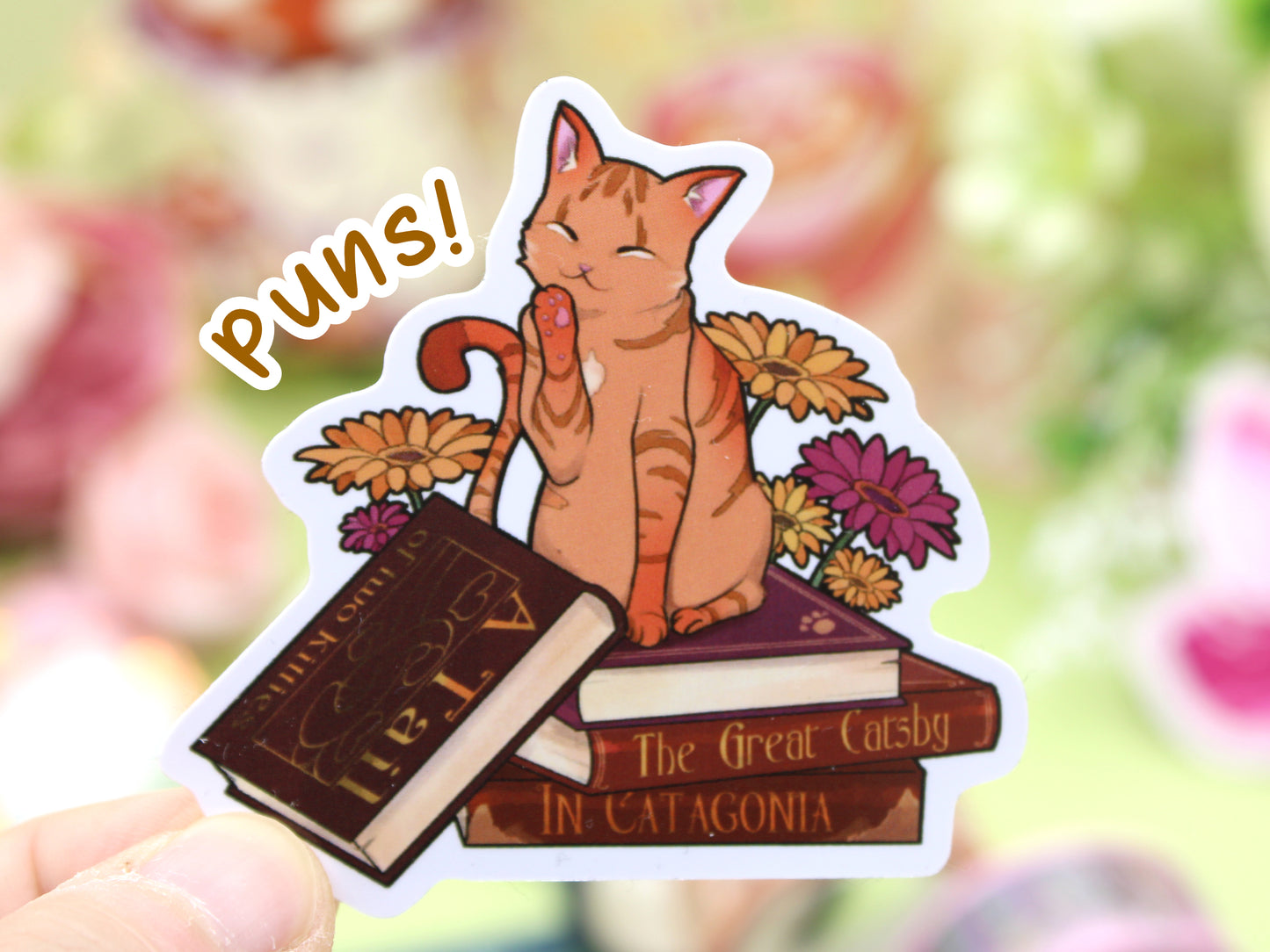Orange Cat and Book Puns Sticker