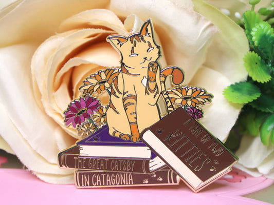 Orange Cat on Book with Puns Hard Enamel Pin