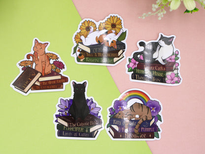 Set of cat-themed stickers on a pink and green background